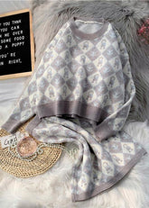 Conjunto de suéter con estampado de dibujos animados de temperamento de nueva moda de otoño e invierno de 2021, suéter de cuello redondo, media falda, conjunto de dos piezas